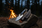 Camping knife by campfire